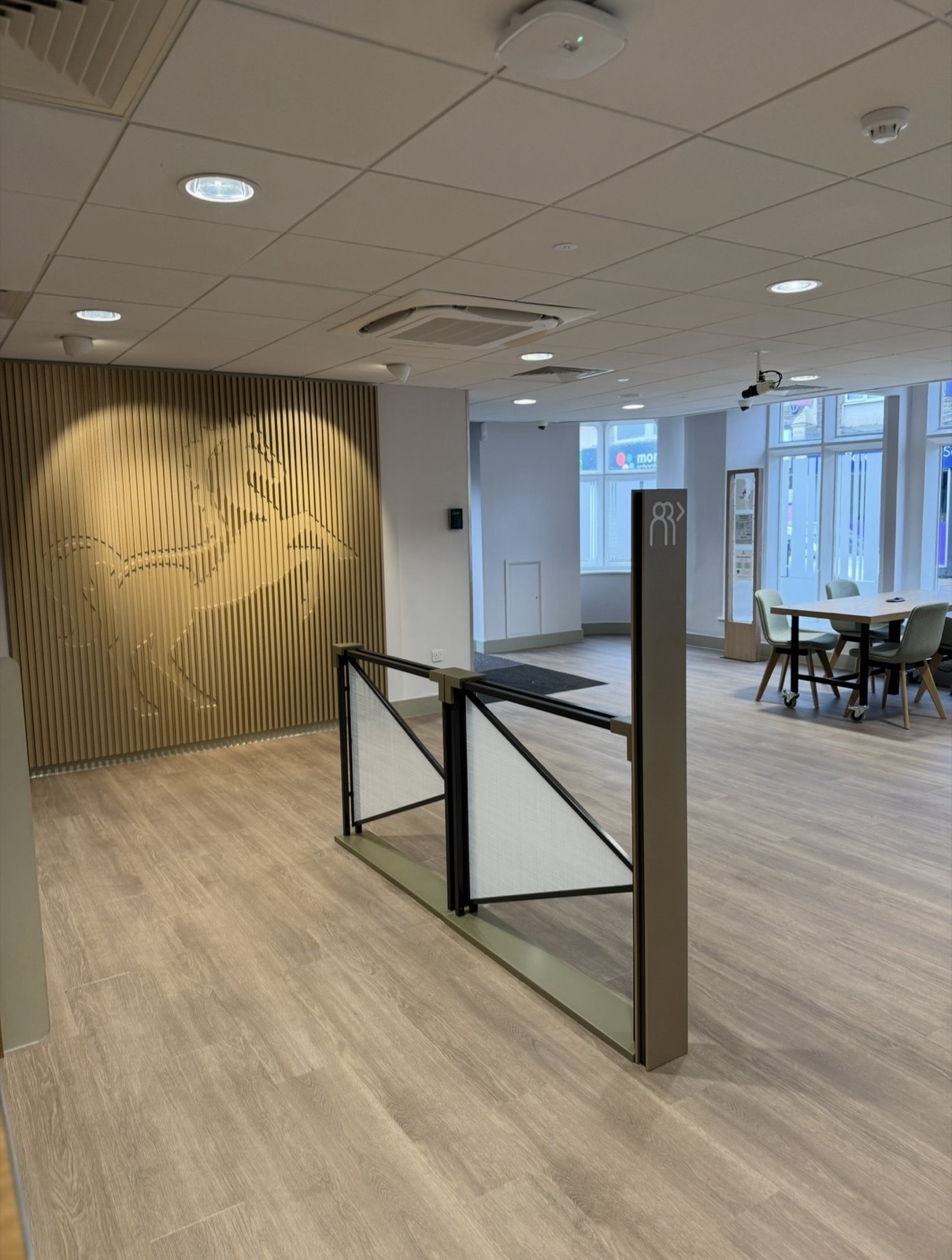 Lloyds Bank branch reception - rampant-horse feature wall after refurbishment
