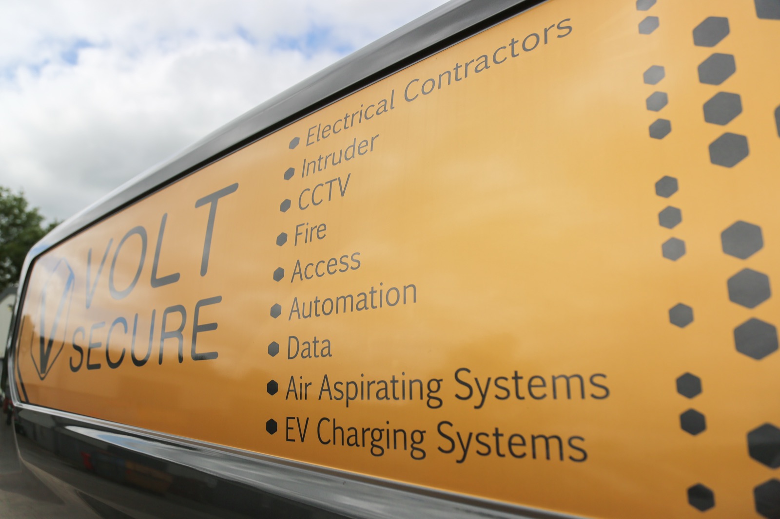 VoltSecure-branded van side livery showing services delivered for LongPlay Coffee, Cardiff